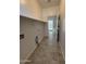 Laundry room with access to backyard at 7309 S 17Th Dr, Phoenix, AZ 85041