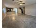 Open living and kitchen area with tile floors at 7309 S 17Th Dr, Phoenix, AZ 85041