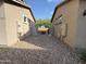 Gravel side yard between two homes at 7309 S 17Th Dr, Phoenix, AZ 85041