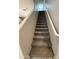 Indoor view of carpeted staircase leading to the second floor at 7309 S 17Th Dr, Phoenix, AZ 85041