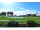 Pond and lush green golf course view at 7813 E Lakeview Ave, Mesa, AZ 85209