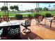 Patio overlooking golf course with seating at 7813 E Lakeview Ave, Mesa, AZ 85209