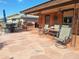 Spacious covered patio with seating area, grill, and pavers at 7813 E Lakeview Ave, Mesa, AZ 85209