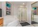 Bathroom featuring a shower, tub, and built-in shelving at 8100 E Camelback Rd # 175, Scottsdale, AZ 85251