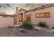 Tan stucco home with single-story design and desert landscaping at 8100 E Camelback Rd # 175, Scottsdale, AZ 85251