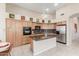 Modern kitchen with granite countertops and stainless steel appliances at 8100 E Camelback Rd # 175, Scottsdale, AZ 85251