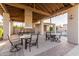 Community patio with fireplace and seating at 8100 E Camelback Rd # 175, Scottsdale, AZ 85251