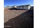 View of backyard, house, and surrounding area at 8306 W Swansea Dr, Arizona City, AZ 85123