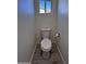 Small bathroom with toilet and window for natural light at 8306 W Swansea Dr, Arizona City, AZ 85123