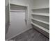 Bright closet with shelves and hanging space at 8306 W Swansea Dr, Arizona City, AZ 85123