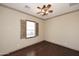 Spacious bedroom with hardwood floors and window at 8911 E Rusty Spur Pl, Scottsdale, AZ 85255