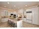 Gourmet kitchen with granite countertops and white cabinets at 8911 E Rusty Spur Pl, Scottsdale, AZ 85255