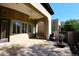 Covered patio with flagstone flooring and ceiling fan at 8911 E Rusty Spur Pl, Scottsdale, AZ 85255