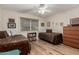 Bright bedroom with hardwood floors and twin beds at 9403 W Fern Dr, Sun City, AZ 85351