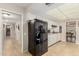 Kitchen features black appliances and ample cabinet space at 9403 W Fern Dr, Sun City, AZ 85351