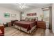 Large main bedroom with hardwood floors and ample closet space at 9403 W Fern Dr, Sun City, AZ 85351