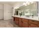 Bathroom featuring a large vanity with a huge mirror and wood drawers at 953 E Fieldstone Pl, Chandler, AZ 85249