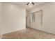 Neutral bedroom showcasing tile floors, natural light from a window, and a ceiling fan at 953 E Fieldstone Pl, Chandler, AZ 85249