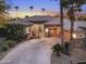 Attractive single-Gathering home boasting a circular driveway, desert landscaping, and a welcoming front porch at 953 E Fieldstone Pl, Chandler, AZ 85249