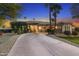 Lovely single-story home featuring desert landscaping, mature palm trees, and a circular driveway at 953 E Fieldstone Pl, Chandler, AZ 85249