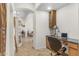 Hallway with a built-in desk and chair, leading to the living room at 953 E Fieldstone Pl, Chandler, AZ 85249