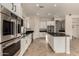 Modern kitchen with stainless steel appliances and lots of counter space at 953 E Fieldstone Pl, Chandler, AZ 85249