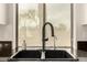 Close up on kitchen sink and faucet with window view at 953 E Fieldstone Pl, Chandler, AZ 85249