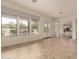 Open-concept room featuring tile flooring and pool view at 953 E Fieldstone Pl, Chandler, AZ 85249