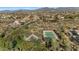 Aerial view of community amenities, including tennis court and playground at 9740 E Lofty Point Rd, Scottsdale, AZ 85262