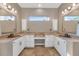 Double vanity bathroom with copper sinks and ample storage at 9740 E Lofty Point Rd, Scottsdale, AZ 85262