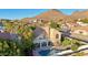 Stunning aerial view of a home with a pool and mountain backdrop at 1071 E Seminole Dr, Phoenix, AZ 85022