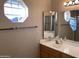 Bathroom with a large mirror and double vanity at 10840 E Keats Ave, Mesa, AZ 85209