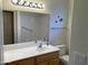Clean bathroom with a vanity, toilet and shower at 10840 E Keats Ave, Mesa, AZ 85209
