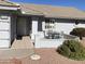 Home exterior featuring a front patio with seating for relaxing at 10840 E Keats Ave, Mesa, AZ 85209