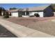 Front view of a single-story house with gravel landscaping at 10840 E Keats Ave, Mesa, AZ 85209