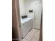 Laundry room with washer, dryer, and storage at 10840 E Keats Ave, Mesa, AZ 85209