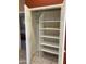 White pantry with adjustable shelves for ample storage at 10840 E Keats Ave, Mesa, AZ 85209