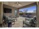 Relaxing covered patio with seating area, views of pool and mountain at 10985 E Buckhorn Dr # 22, Scottsdale, AZ 85262