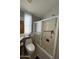 Clean bathroom with a shower/tub combo, toilet, and a linen closet at 1448 S Zuni --, Apache Junction, AZ 85119
