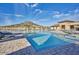 Community pool with plenty of lounge chairs at 15208 S 182Nd Ln, Goodyear, AZ 85338