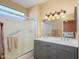 Bathroom features a double vanity and large shower at 16422 W La Posada Ln, Surprise, AZ 85374