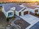 Single-story house with a two-car garage and landscaping at 16541 W Edgemont Ave, Goodyear, AZ 85395