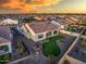 Home with grassy backyard, surrounded by other homes at 16541 W Edgemont Ave, Goodyear, AZ 85395