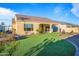 Home exterior showcasing backyard and patio at 16541 W Edgemont Ave, Goodyear, AZ 85395