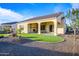 Home exterior showcasing backyard and patio at 16541 W Edgemont Ave, Goodyear, AZ 85395