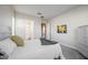 Bright bedroom with ensuite bathroom access at 16541 W Edgemont Ave, Goodyear, AZ 85395