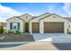 One-story home with two-car garage and desert landscaping at 16541 W Edgemont Ave, Goodyear, AZ 85395