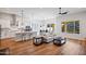 Modern kitchen with white cabinets and island at 16541 W Edgemont Ave, Goodyear, AZ 85395