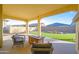 Relaxing patio with fire pit and seating area at 16541 W Edgemont Ave, Goodyear, AZ 85395