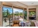 Sliding glass doors reveal a relaxing patio and view of the backyard at 18411 E Tranquilo Way, Rio Verde, AZ 85263